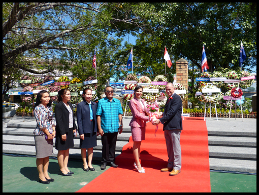 Mike Chapman presents a bouquet to Ann whilst the Governor lines up with some of his guests.