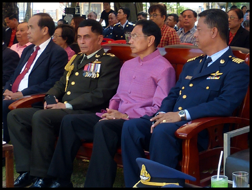 The Governor of Ubon sits centre stage flanked by his Generals.