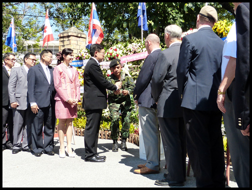 The Governor lights a candle of hope.