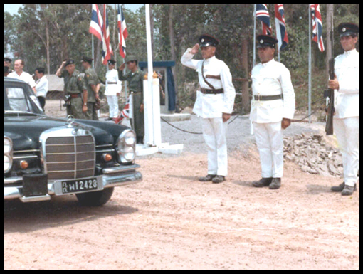 WO1 Peter Davidson leads the Honour Guard salute at Nong Phoc.