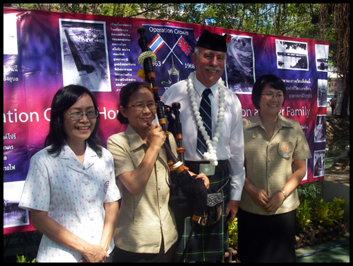 Neil Campbell with relatives of Little Mother Ubon and the Orchestra.