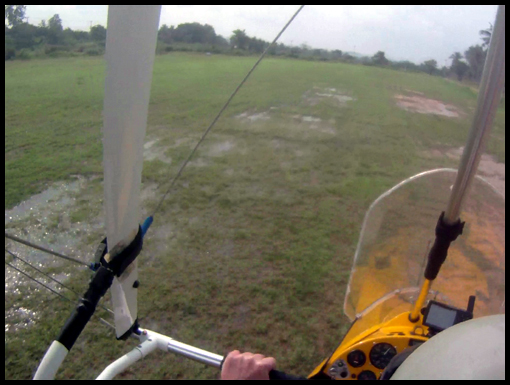 Water collects on the surface of Nong Prue runway 14.