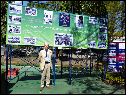 Dave 'Satch' Higgins poses for a shot of one of the OCA banners.