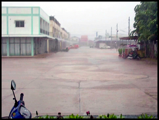 A tropical storm lashes down on Loeng Nok Tha.