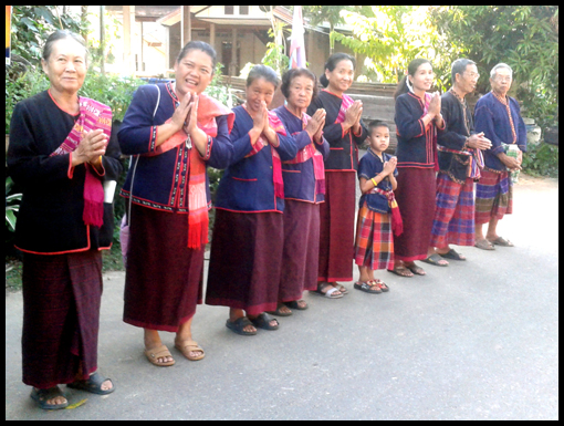 The Ban Pao communty lay on a reception party.