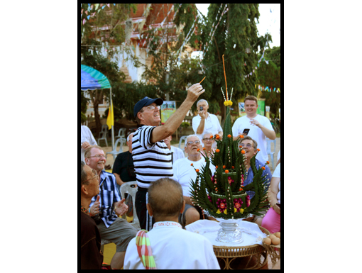 Neville lights the candle atop of the Pah Kwan