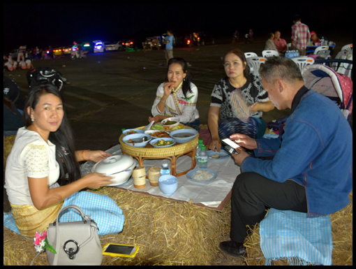 Aek and his party tuck into dinner