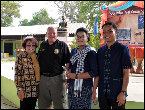 Bruce and Noi Templeman make a cash donation to the Hong Khong school funds.