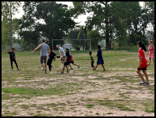 Alan Myers Referee's an impromptu football game.