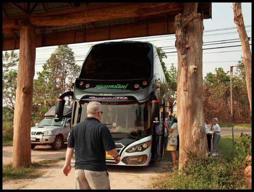 the coach cannot pass under the archway.