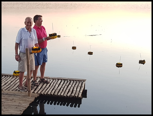 Nev and Harry, Bill and Anne float Krathong's