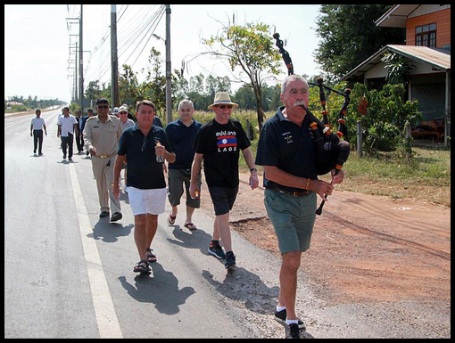 Neil Campbell leads the group into Khok Samran school.