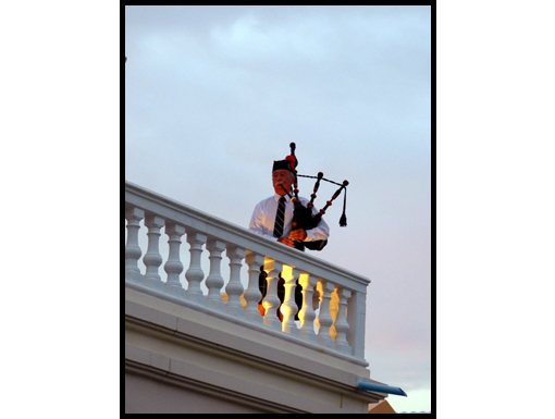 Sgt Phongpitak and Neil Campbell perform on the Seven Seas balcony.