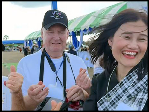 Ray Hough tries to get his sausage fingers to form a 'Little Heart'.