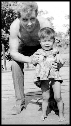 Harry Collar helps a little girl pose for the camera